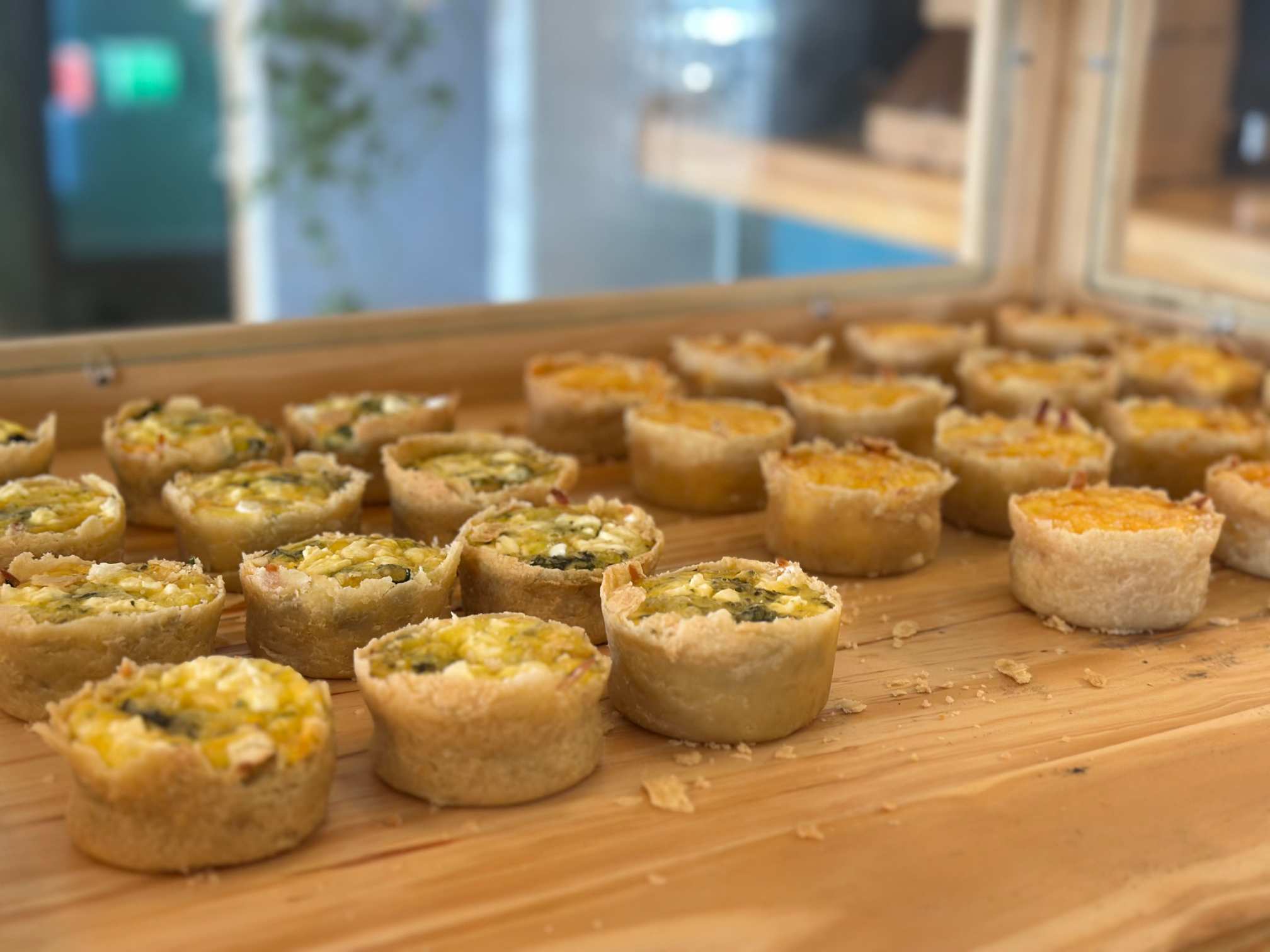 Various quiches on a table